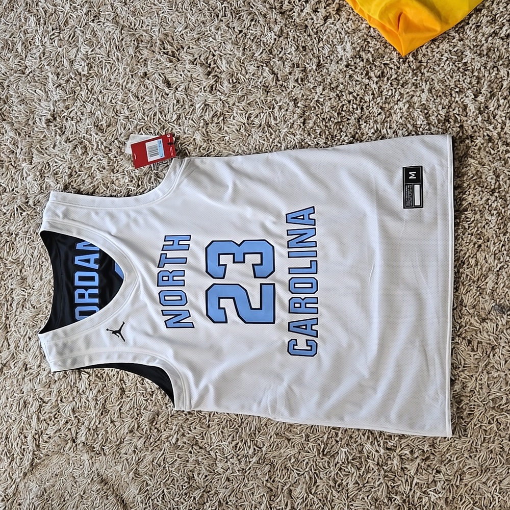 UNIVERSITY OF NORTH CAROLINA REVERSIBLE BASKETBALL JERSEY